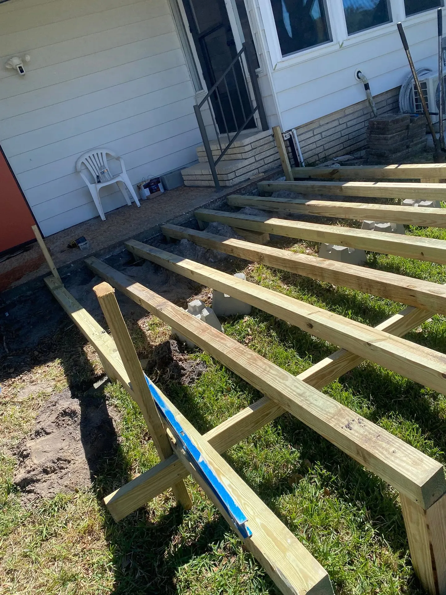 Wood deck during construction and after completion.