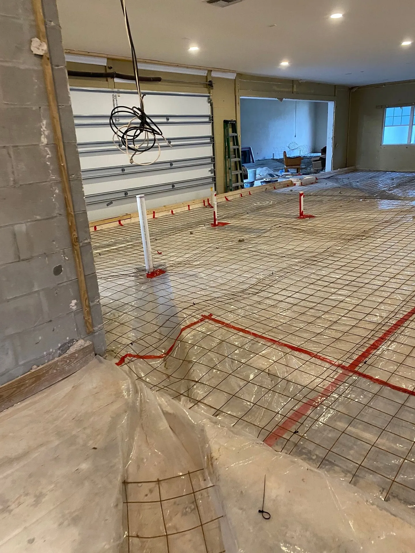 Interior surface during different stages of floor preparation.