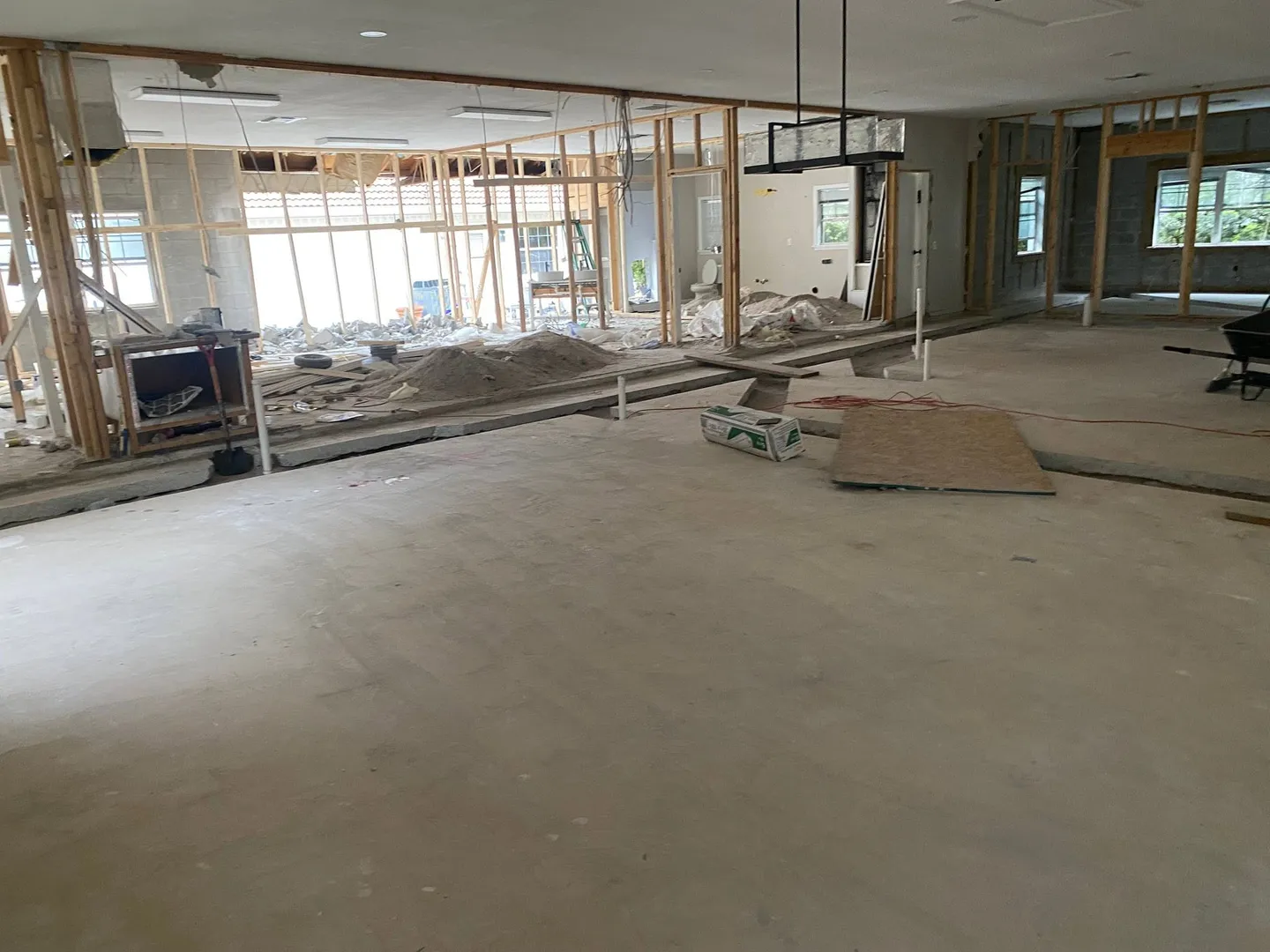 Interior surface during different stages of floor preparation.