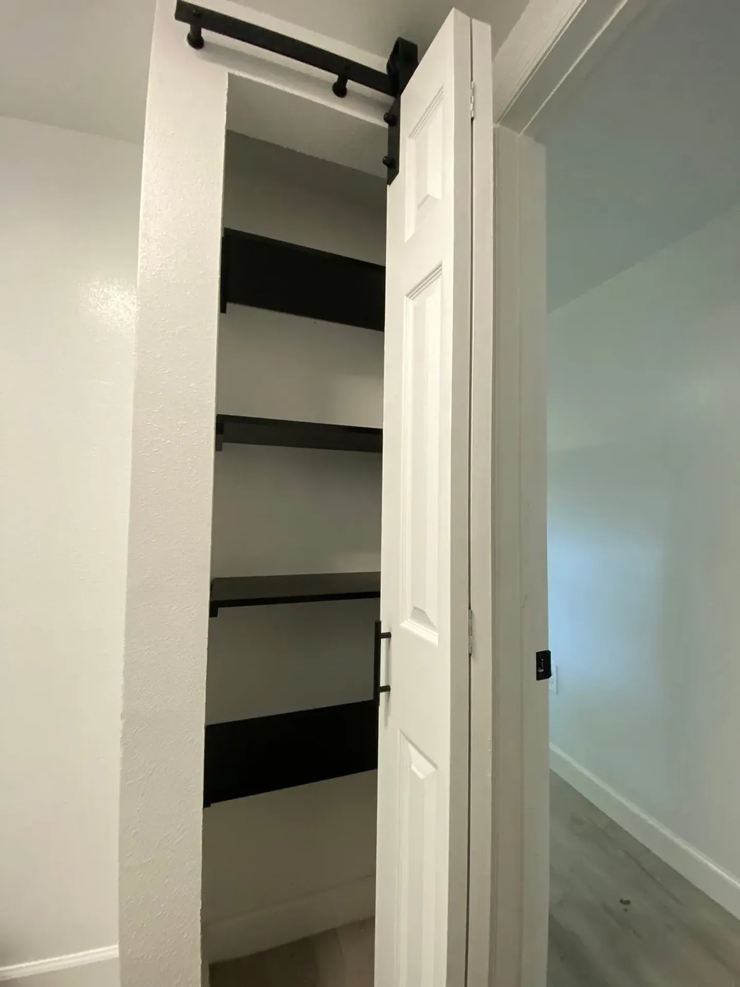 Completed interior, bathroom, door, shelving and exterior improvements.