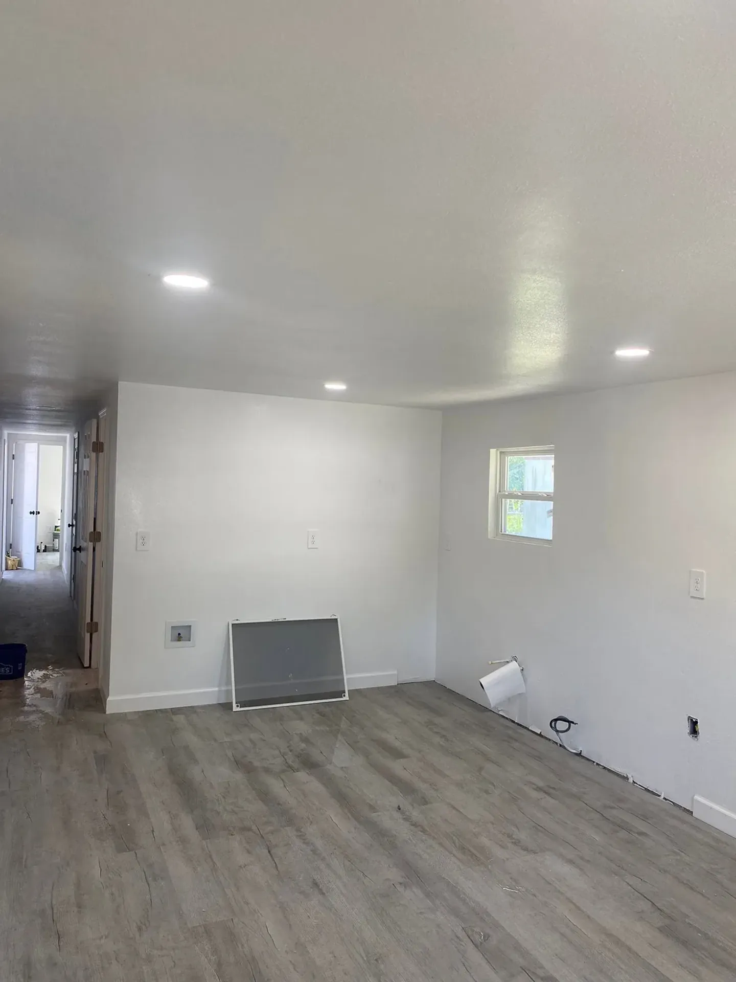 Completed interior, bathroom, door, shelving and exterior improvements.