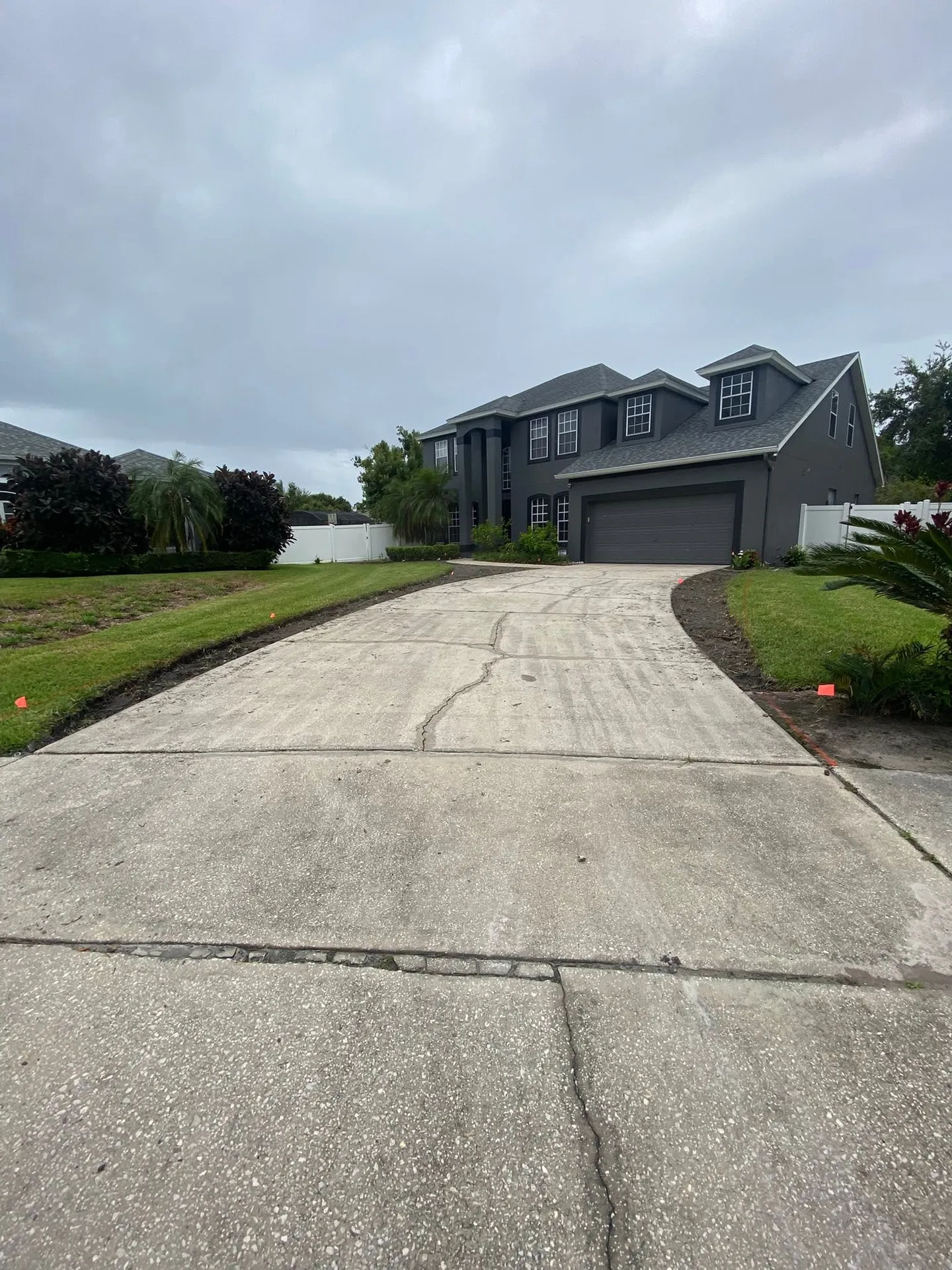 Paver driveway and walkway at different stages of the project.