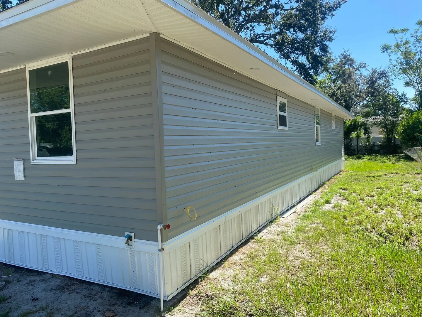 Completed interior, bathroom, door, shelving and exterior improvements.